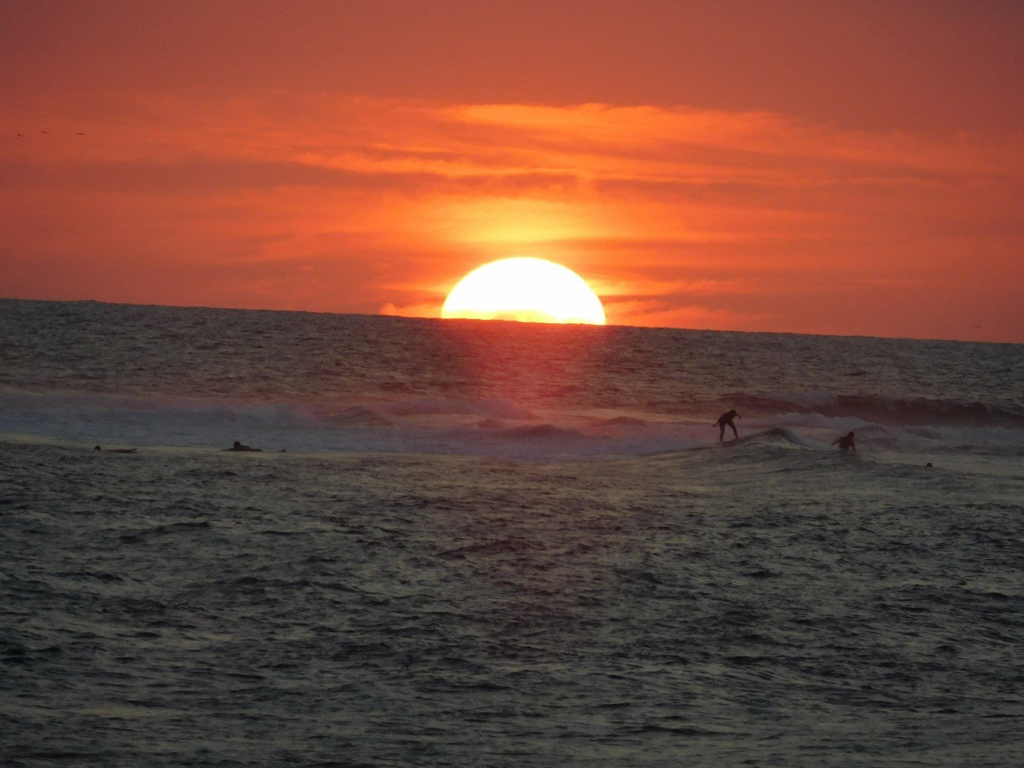 Surfs up as the sun goes down