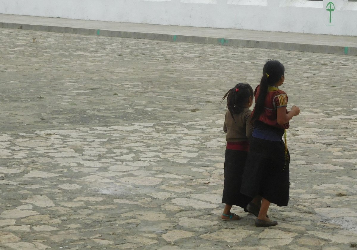 Girls wearing the traditional skirt